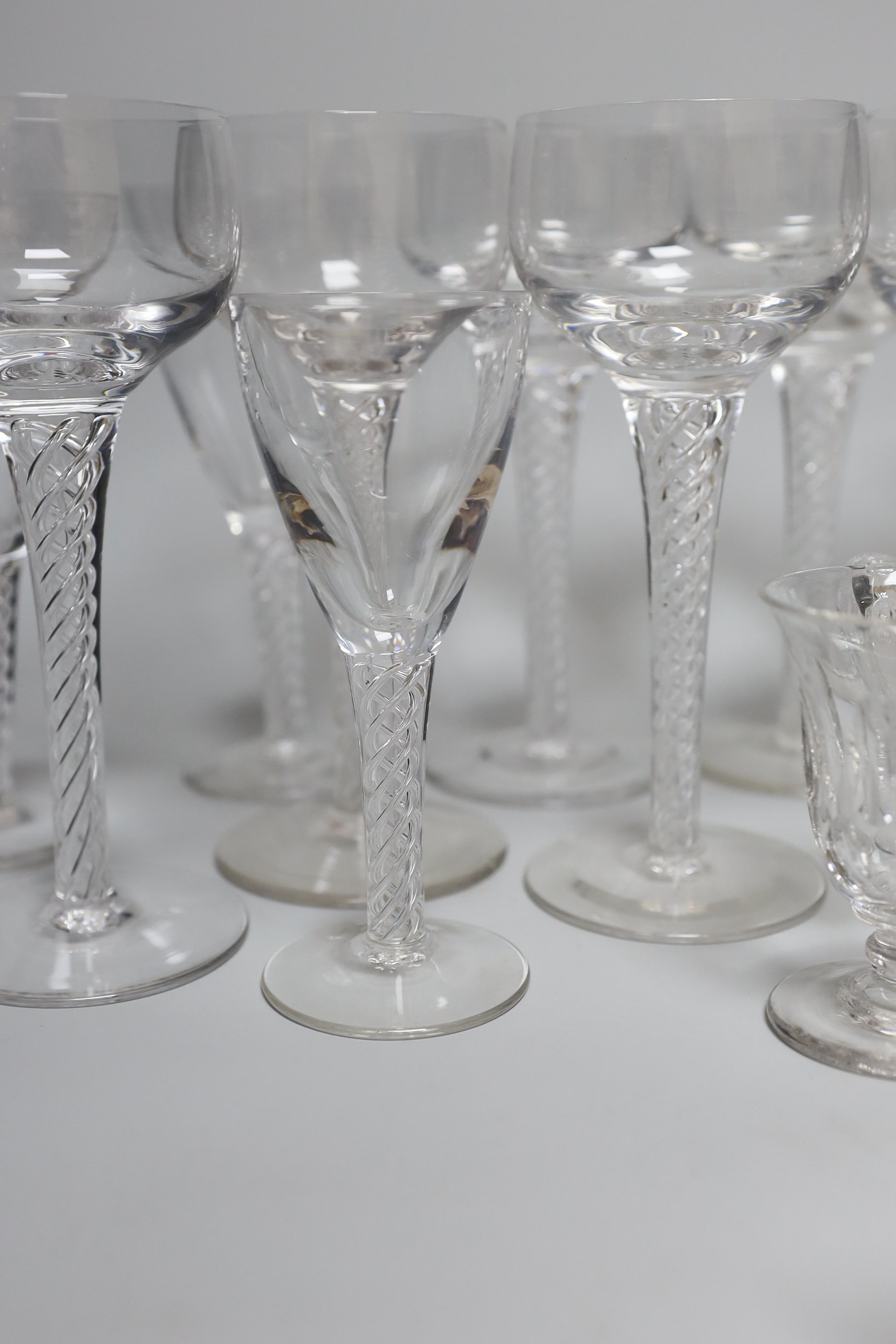 A set of eight 20th century air twist champagne coupe glasses, five others and five custard glasses